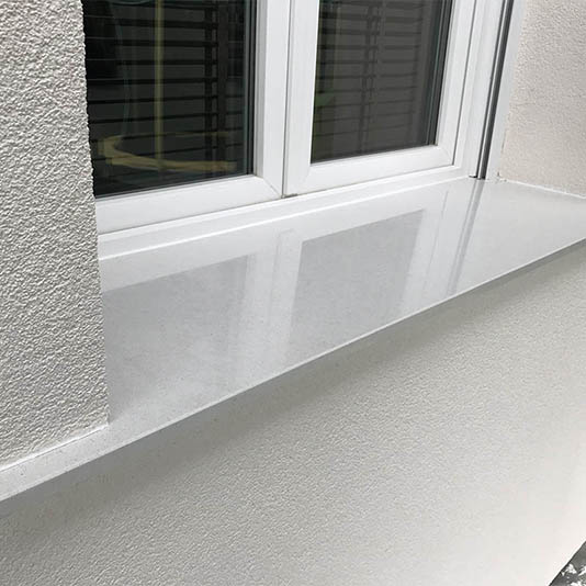 photo d'un appui de fenêtre en granit blanc